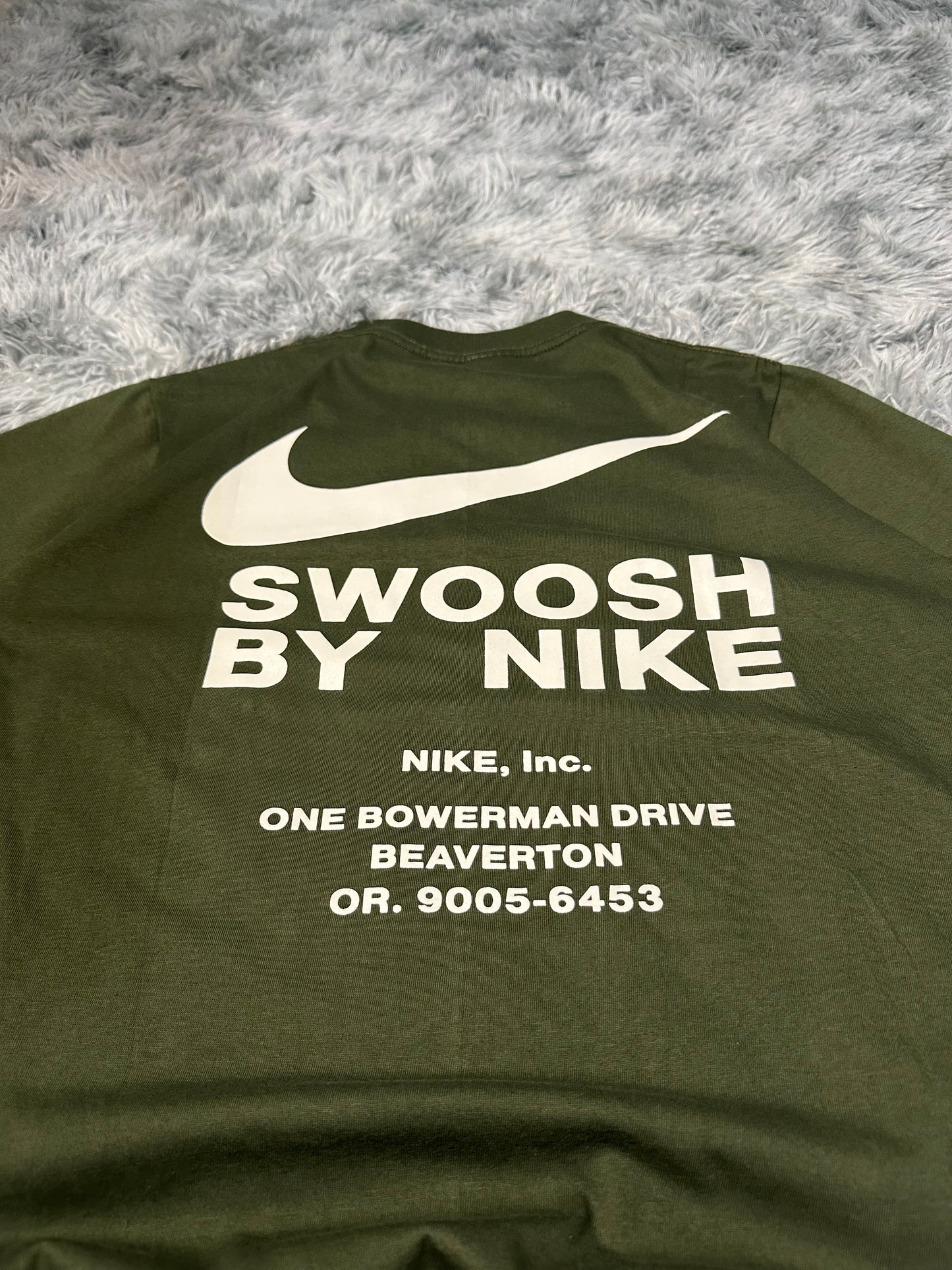 REMERA NIKE INC