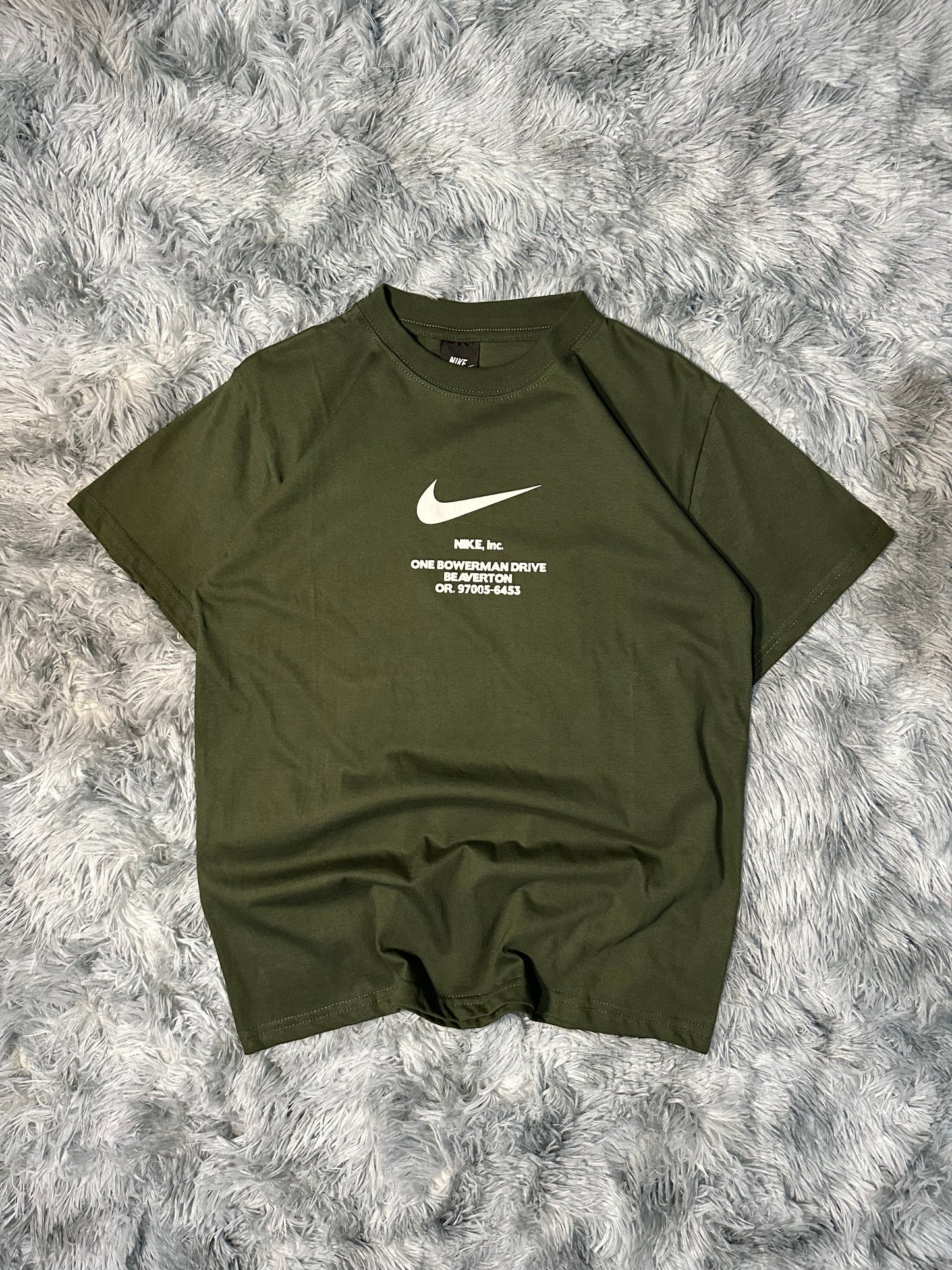 REMERA NIKE INC