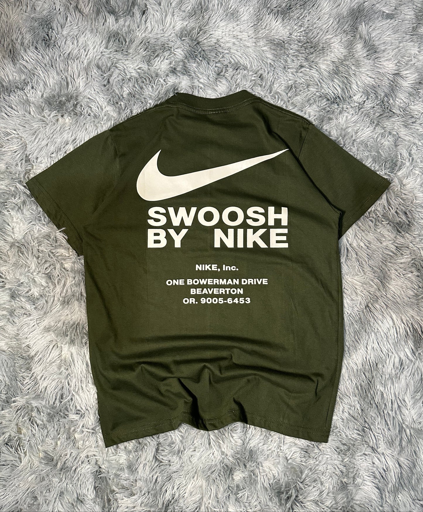 REMERA NIKE INC