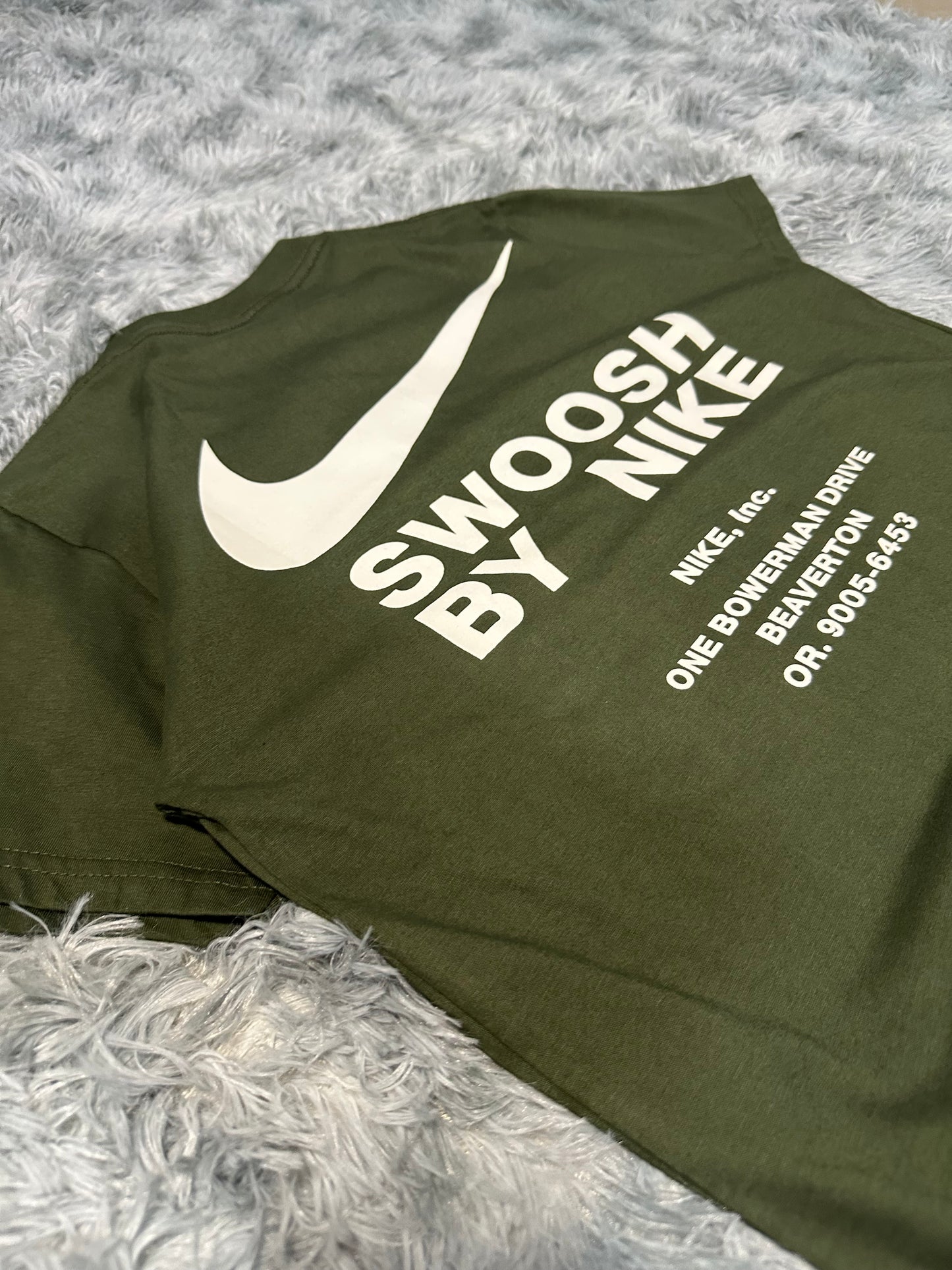REMERA NIKE INC