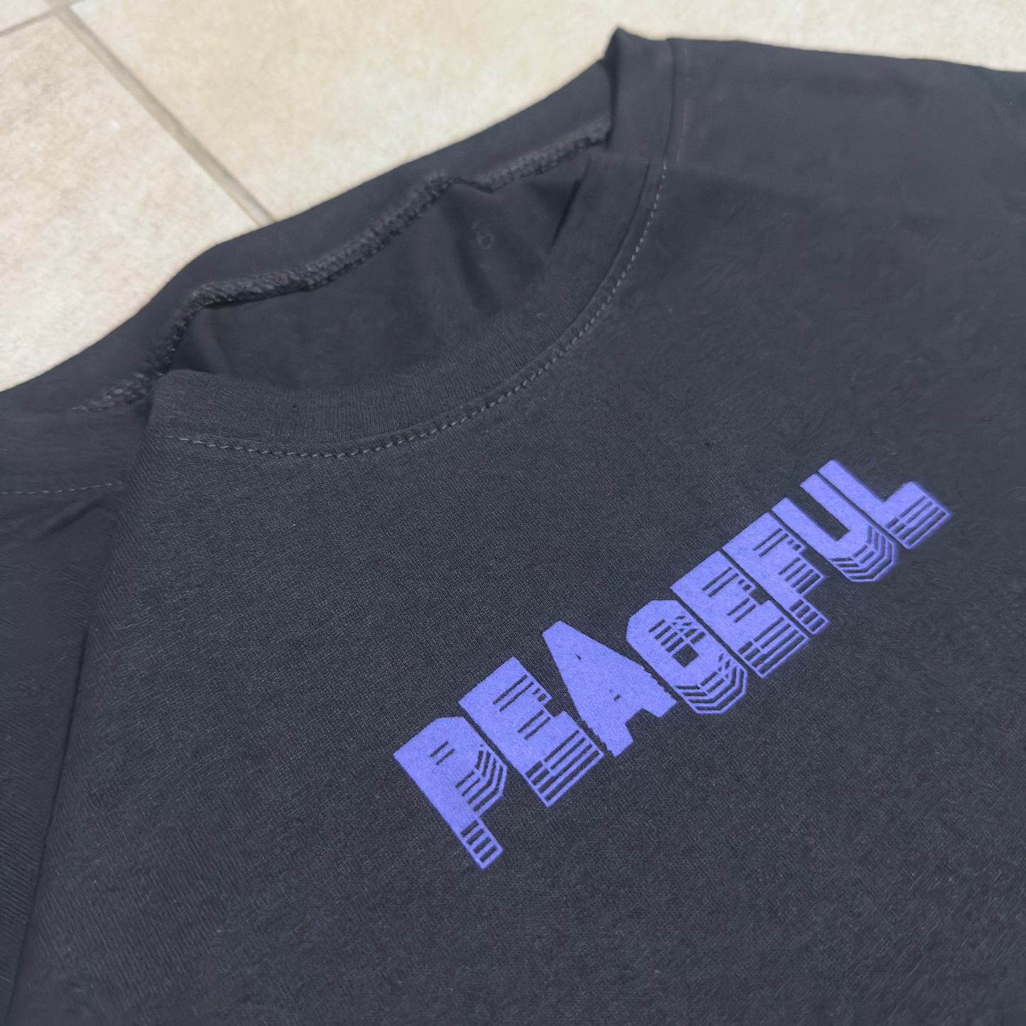 REMERA OVERSIZE PEACEFUL